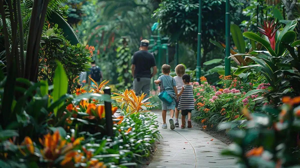 Parents and children strolling through a botanical garden, marveling at the vibrant flowers and plants.