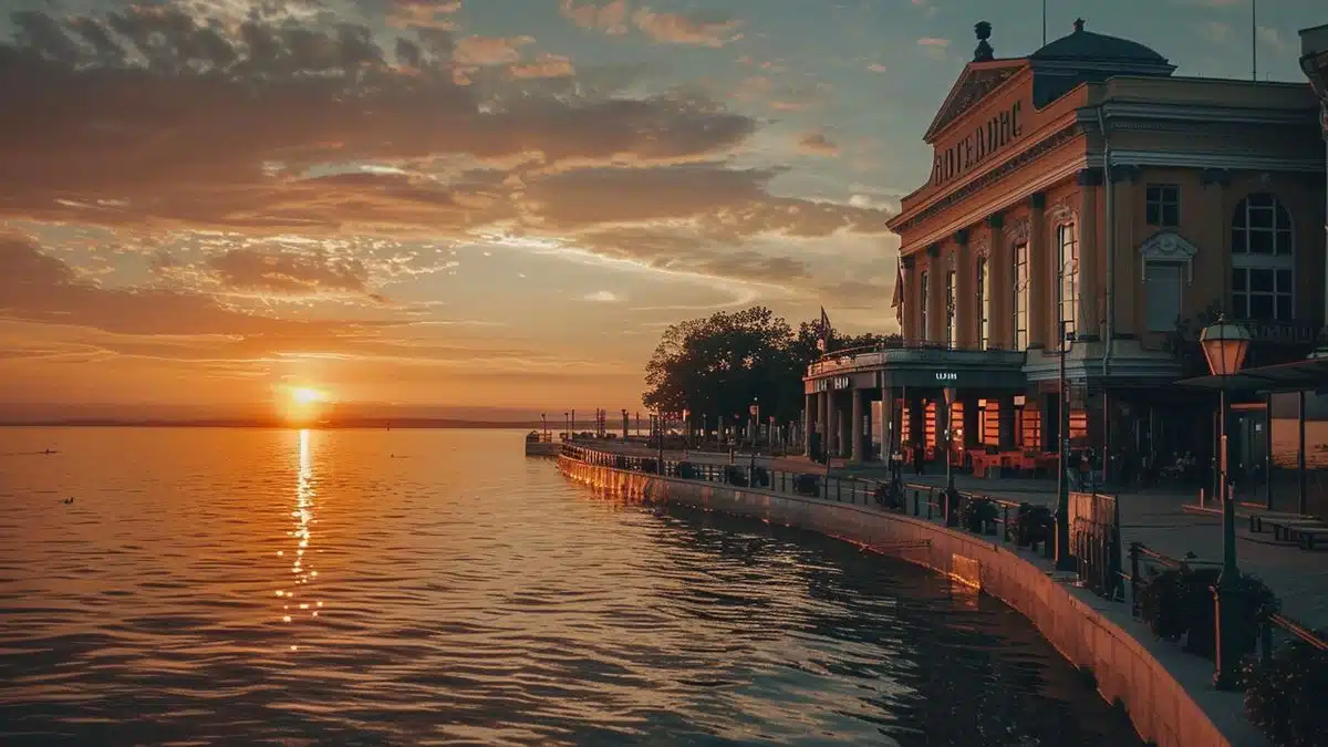 Beautiful sunset over the theater on water.